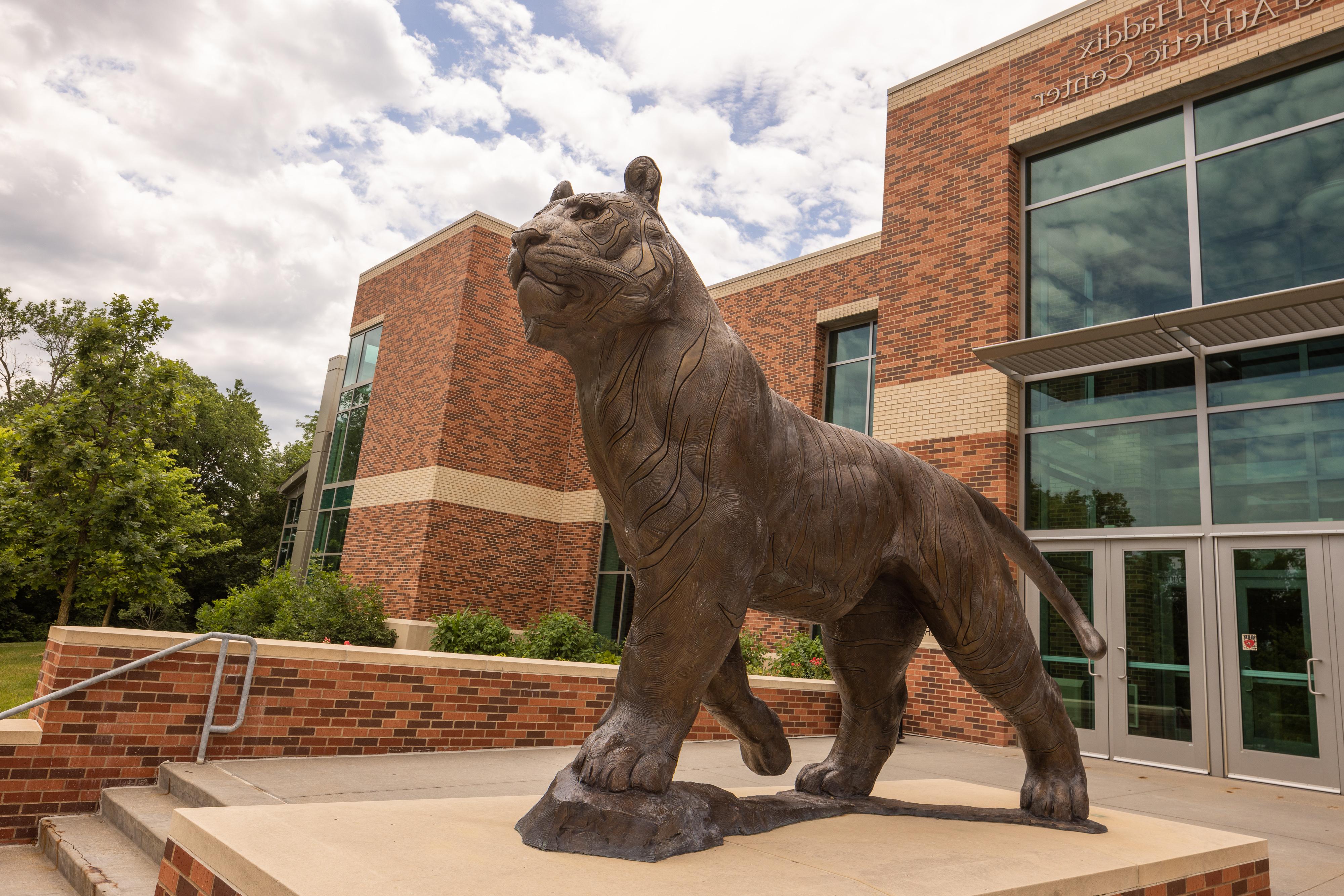 brass sculpture of tiger on doane campus